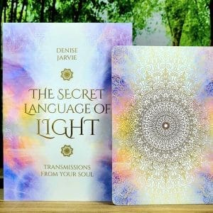 The Secret Language of Light Oracle by Denise Jarvie - guidebook and back of cards