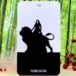 Black Violet Tarot Cards by Heidi Phelps - Strength